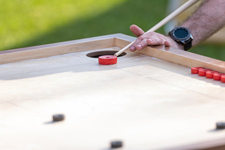 Men playing Novuss game. Novuss is a national sport in Latvia similar to pocket billiards or pool.の写真素材