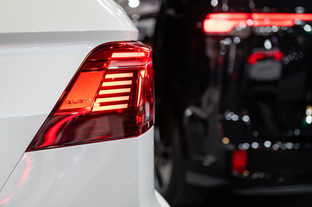 Riga, Latvia, April 28, 2023: LED rear lights and car design closeup of nev Volkswagen Tiguan, model...