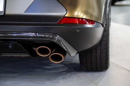 Riga, Latvia, April 28, 2023: Cupra Formentor exhaust muffler, rear view, closeupのeditorial素材