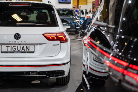 Riga, Latvia, April 28, 2023: LED taillights and car design of Volkswagen Tiguan crossover, model...