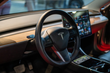 Riga, Latvia, April 28, 2023: interor of Tesla Model Y. Tesla screen, steering wheel, interor car electric ev vehicleのeditorial素材