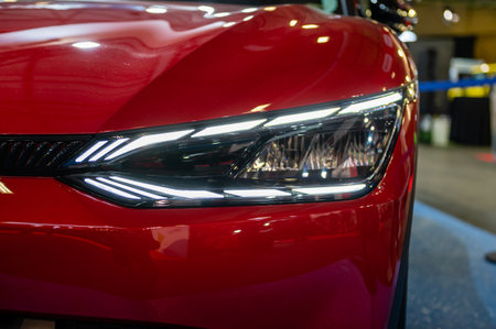 Riga, Latvia, April 28, 2023: LED headlights and car design closeup of nev KIA EV6, model 2023のeditorial素材