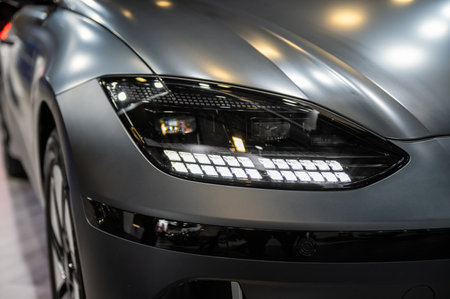 Riga, Latvia, April 28, 2023: LED headlights and car design closeup of nev Hyundai Ioniq 6 electric...