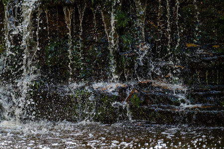 Close-up of falling and splashing streams of water, Ivande waterfall, Latvia
