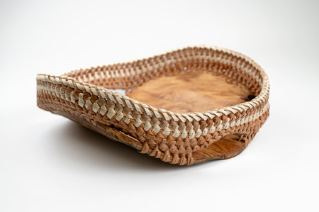 Handmade wooden decorative candy container isolated on white background. Selective focus.の写真素材