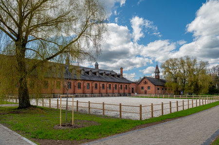 Zagare manor red brick stud farm complex on a sunny spring day, Lithuaniaの写真素材