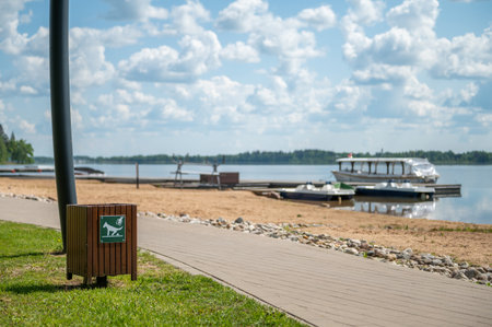 Boats on the shore of the lake in the summer time. Aluksne, Latviaの写真素材