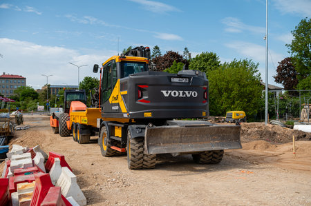 Saldus, Latvia - May 28, 2023: Road construction equipment at the construction site of the road...
