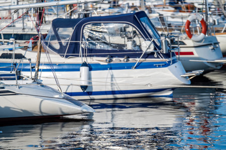 The yacht is moored in the bay. many beautiful moored sailing yachts in the sea port