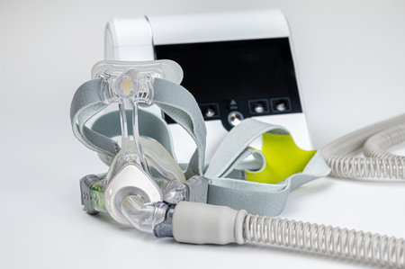 CPAP machine with mask and hose, for people with sleep apnea, respiratory, or breathing disorder