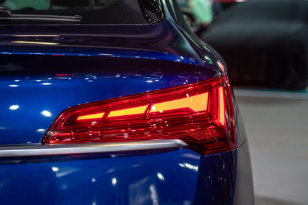 Car taillight. LED red taillight. Closeup tail light of a modern car.