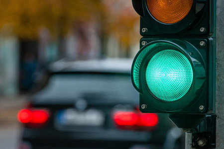 A city crossing with a semaphore. Green light in semaphore - imageの写真素材