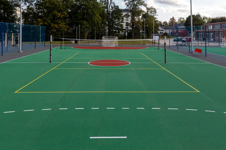 A new multi-sport court offers space for basketball and tennis in a community park.の写真素材