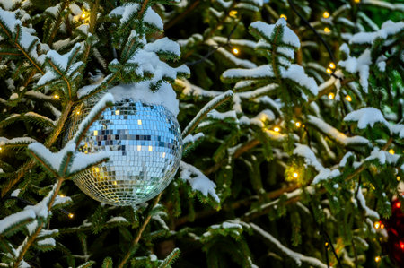 Blurred background of Christmas tree with decorations. Bokeh garlands in the background.の写真素材