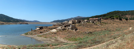 Water fills the remnants of Sfendali village in Crete, revealing history beneath the surface.の写真素材