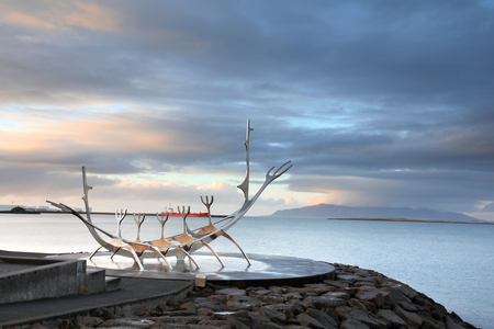 Sun Voyager monument, clouds, landmark of Reykjavik city.の写真素材
