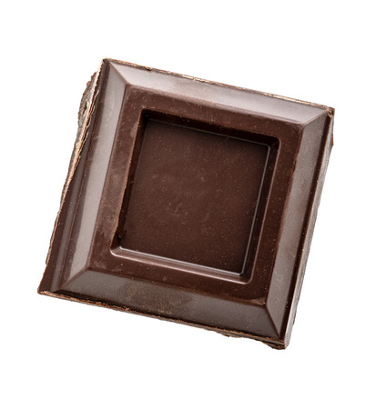 Pieces of dark chocolate isolated with shadow on white backgroundの写真素材