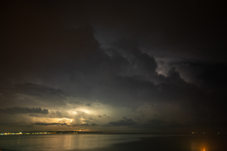 Thunderstorm over the sea, lightning beats the seaの写真素材