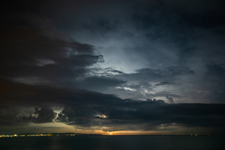 Thunderstorm over the sea, lightning beats the seaの写真素材