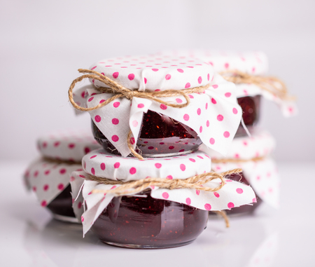 Red handmade jam isolated