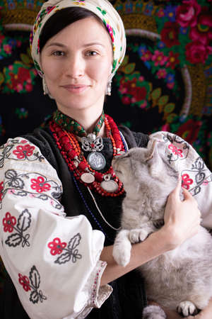 A girl in traditional Ukrainian clothing on black backgroundの写真素材