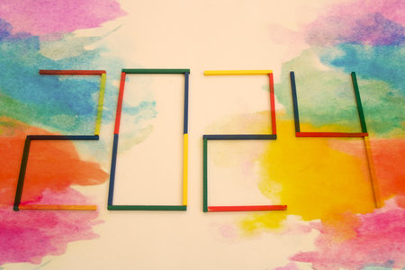 Happy New Year 2024 Idea. Transition from 2023 to new year 2024 concept with text on wooden blocks. Creative Concept.の写真素材