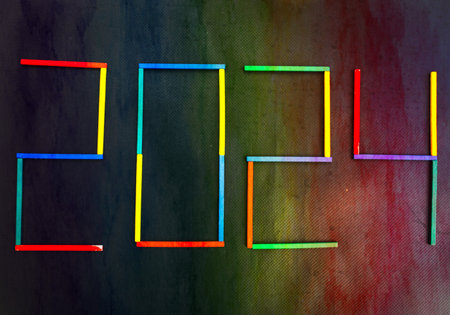 Happy New Year 2024 Idea. Transition from 2023 to new year 2024 concept with text on wooden blocks. Creative Concept.の写真素材