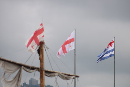 Georgian flag waving in the skyの写真素材