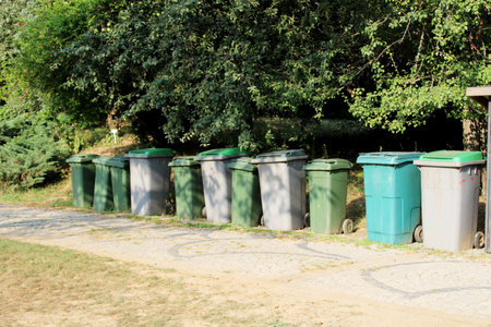 Plastic garbage bins in the forest area. trash cans for recycling.