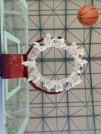 a basketball hoop with a basketball in the middle of it