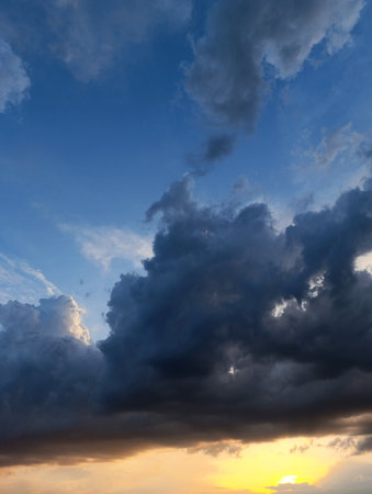 Dramatic Cloudscape and Sunset Over a Blue Sky