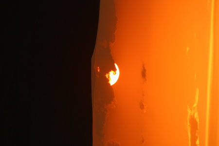 Fiery Sunset over the Horizon. Dramatic skyの写真素材