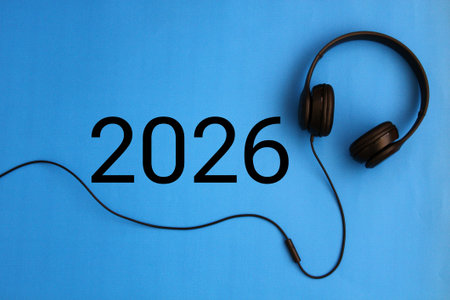 happy new year 2026. Year 2026 with headphones. creativity inspiration, planning ideas concept. Colorful background.の写真素材