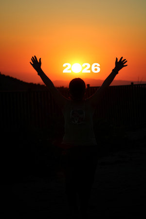 2026 new year concept. Embracing the Future Sunset Silhouette with 2026.の写真素材