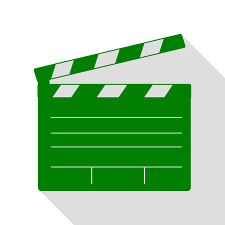 Film clap board cinema sign. Green icon with flat style shadow path.のイラスト素材