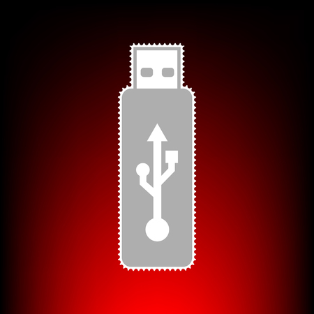Vector USB flash drive sign. Postage stamp or old photo style on red-black gradient background.のイラスト素材