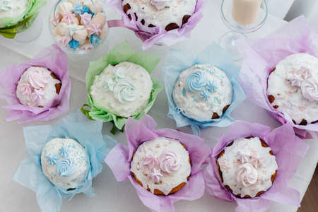Beautiful Easter cakes on a decorated light table. A light holiday of Easter.