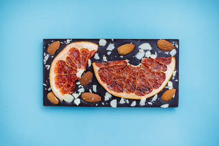 Natural handmade chocolate close-up on a bright background.の写真素材