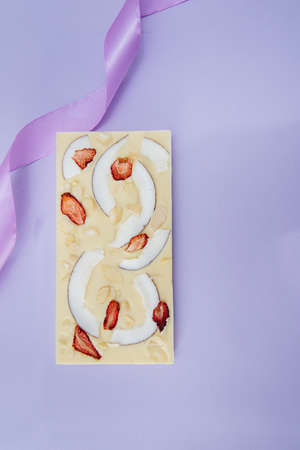 Natural handmade chocolate close-up on a bright background.の写真素材