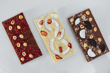 Natural handmade chocolate close-up on a bright background.の写真素材