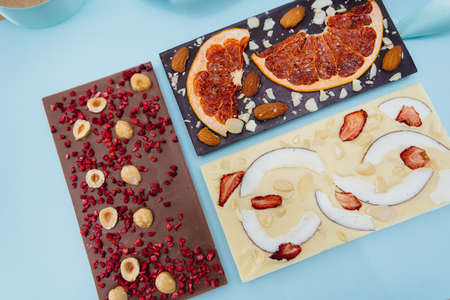 Natural handmade chocolate close-up on a bright background.