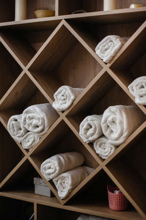 Wardrobe with clean towels in the Spa beauty salonの写真素材