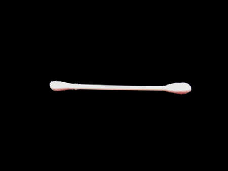Cotton buds isolated on black backgroundの写真素材