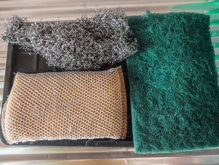 Steel wool and Sponge dishwasherの写真素材