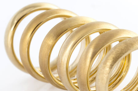 Six wedding rings with different surface to help choose the perfect ring isolated on whiteの写真素材