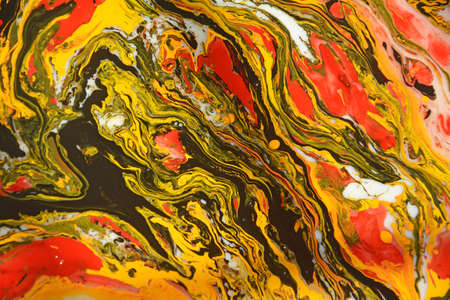 Closeup abstract color mixing of water, acrylic,oil and milk for use as background image.Beautiful combination. Acrylic texture with beautiful pattern, multi color background photo.の写真素材