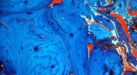 Photographs of Splash paint.Closeup abstract color mixing of water, acrylic,oil and milk for use as background image. Acrylic texture with marble or ocean pattern, multi color background photoの写真素材