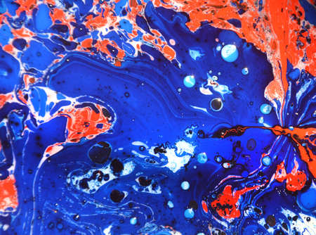 Closeup abstract color mixing of water, acrylic,oil and milk for use as background image. Acrylic texture with beautiful pattern, multi color background photo.の写真素材