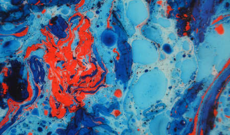 Photographs of Splash paint.Closeup abstract color mixing of water, acrylic,oil and milk for use as background image. Acrylic texture with marble or ocean pattern, multi color background photoの写真素材