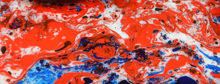 Photographs of Splash paint.Closeup abstract color mixing of water, acrylic,oil and milk for use as background image. Acrylic texture with marble or ocean pattern, multi color background photoの写真素材